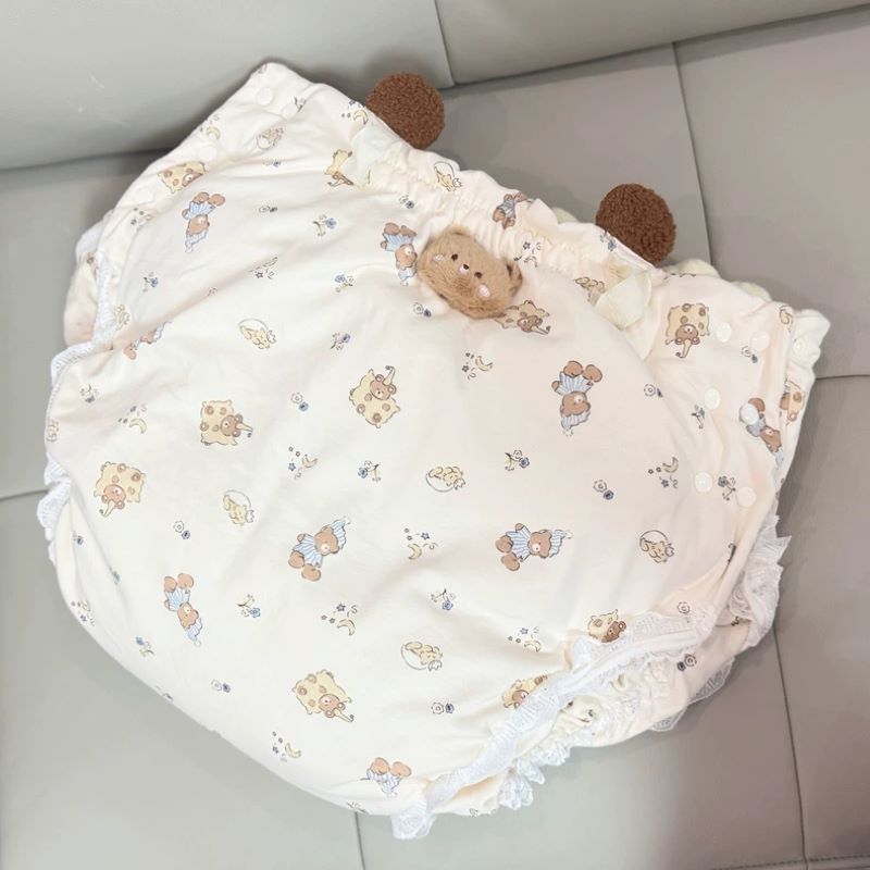 大人用コットン製、漫画柄の布製おむつ。長めの丈で厚みがあり、 - Embellish Knit のレビューと価格